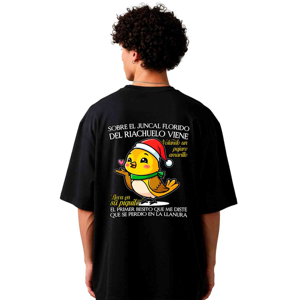 SOBRE EL JUNCAL FLORIDO DEL RIACHUELO VIENE VOLANDO UN PÁJARO AMARILLO.